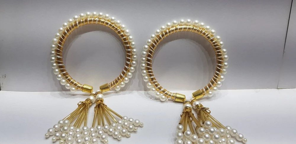 White Peral and gold bracelet with danglers
